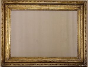 cornice in legno dorato con eleganti decorazioni in pastiglia e vari elementi decorativi luce cm.80x59 est.82x110 Francia I°XIX° sec.